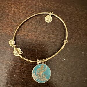Alex and Ani Disney Gold Bracelet with Blue Charm
